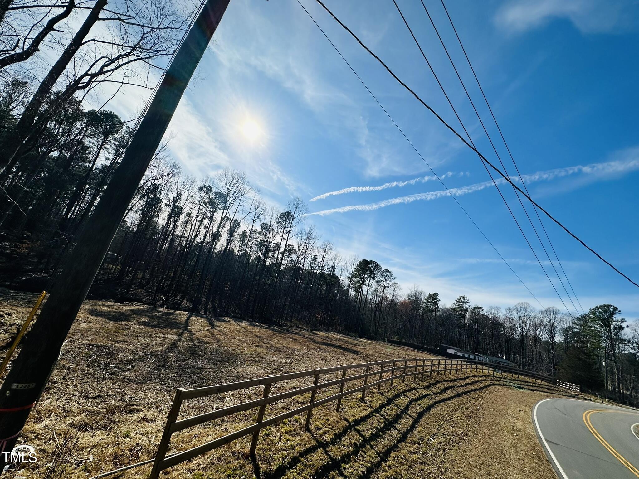 105 Old John Mitchell Road Youngsville, NC 27596 - Photo 2 of 10 a view of a backyard