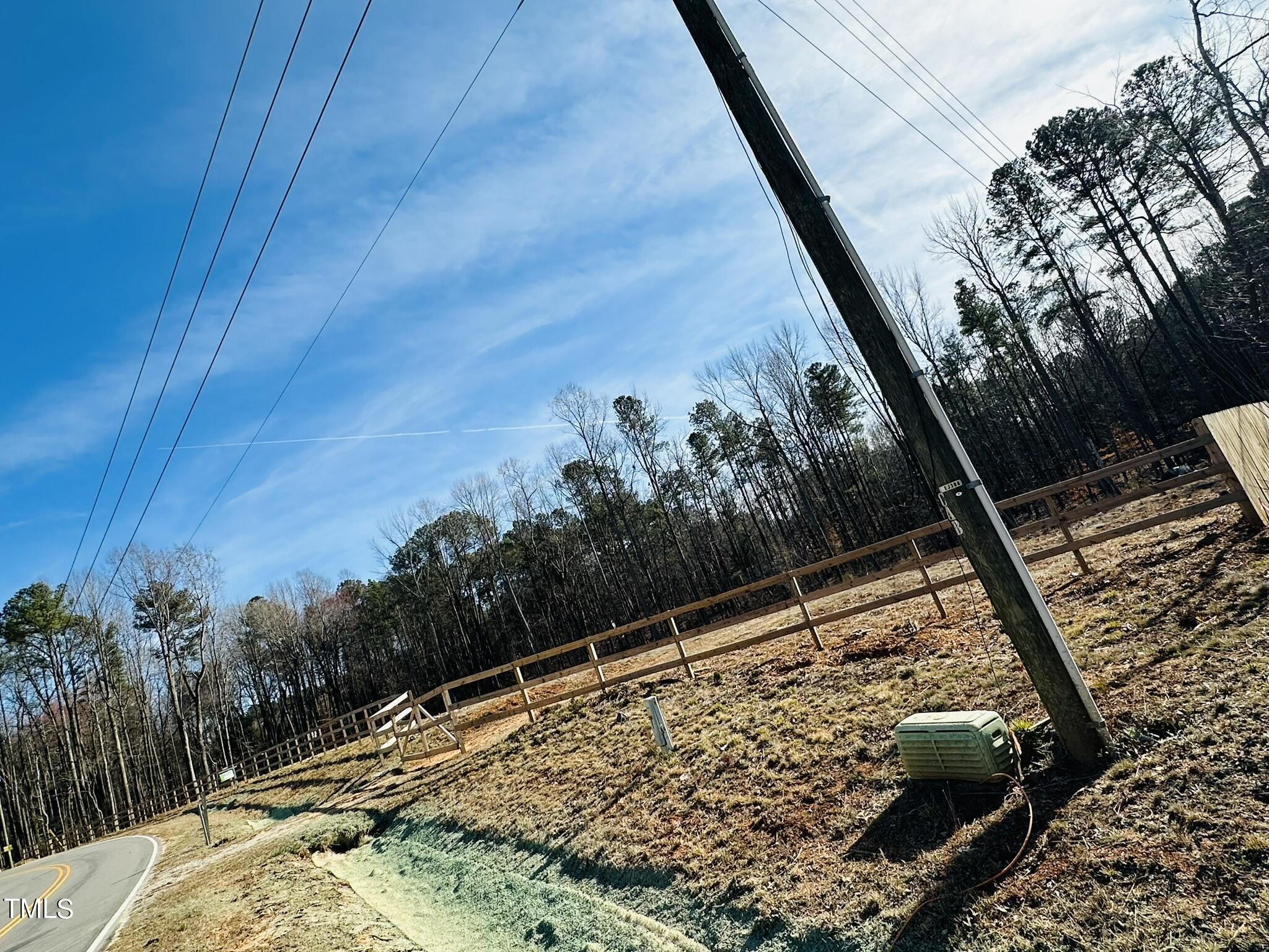 105 Old John Mitchell Road Youngsville, NC 27596 - Photo 3 of 10 a view of a backyard