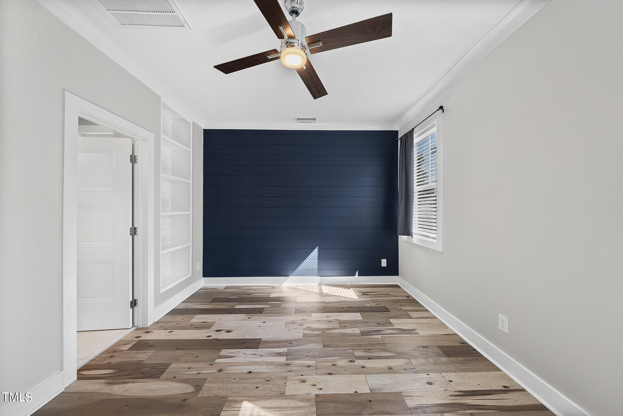 421 Como Drive Raleigh, NC 27610 - Photo 15 of 28 a view of a livingroom with a ceiling fan