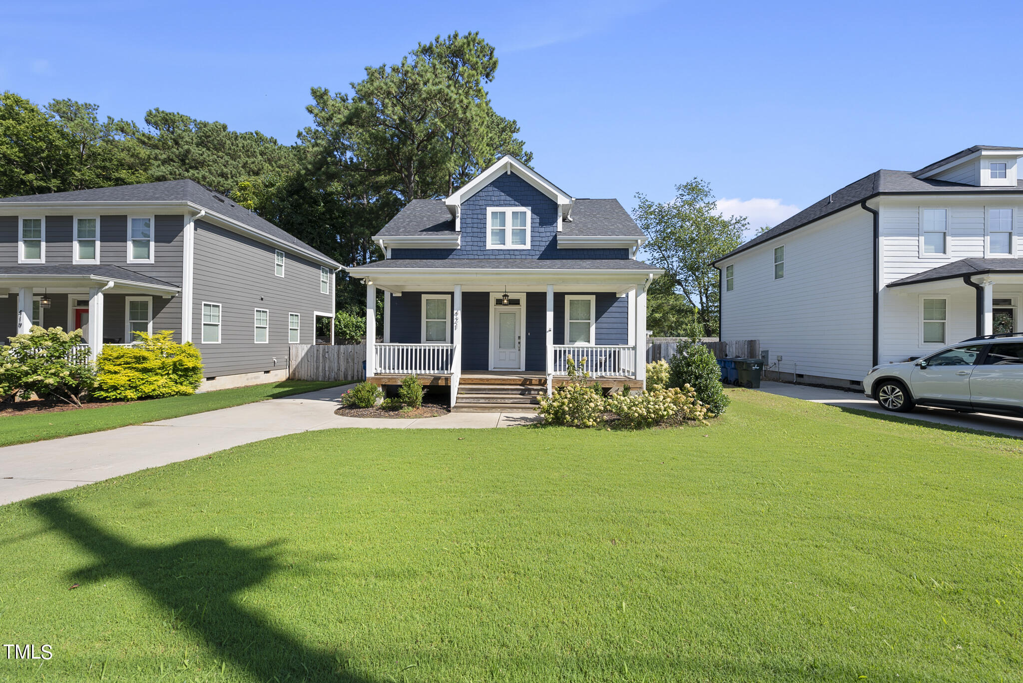 421 Como Drive Raleigh, NC 27610 - Photo 2 of 28 a view of a house with swimming pool and porch