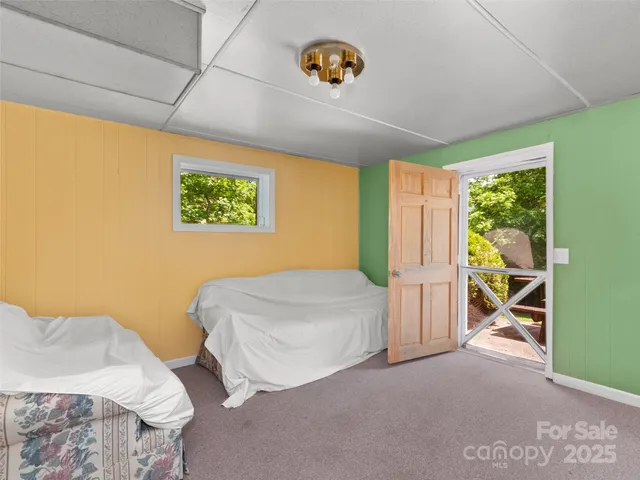 a bedroom with a bed and a cabinets