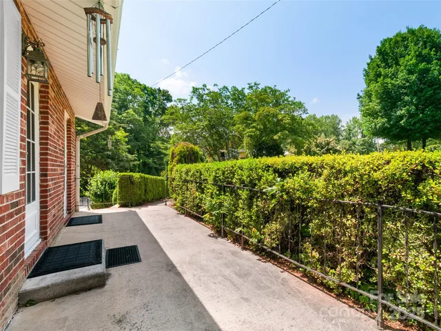 a view of a garden with pathway