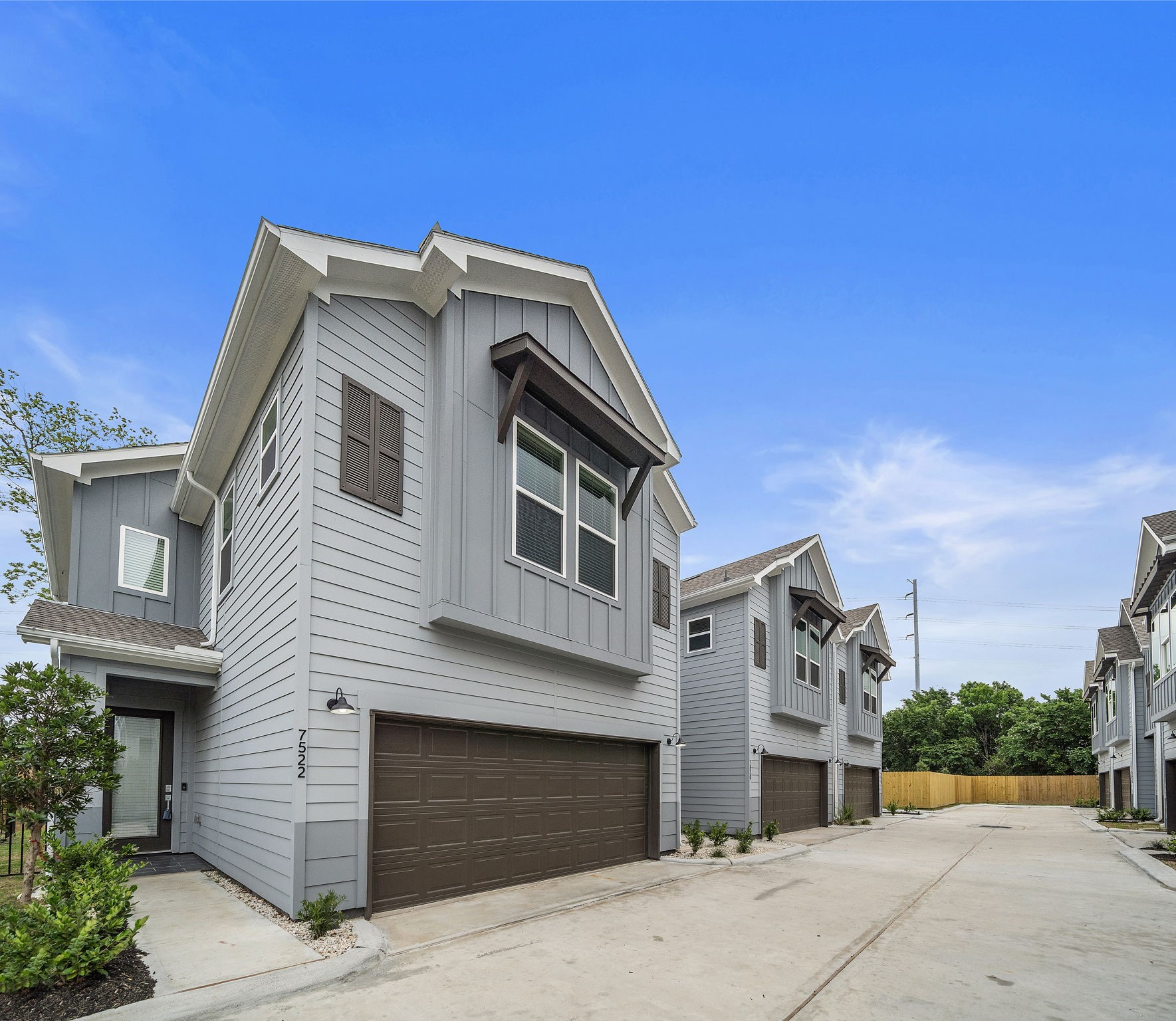 7522 Sandle Street Houston, TX 77088 - Photo 2 of 26 a front view of a house with a yard