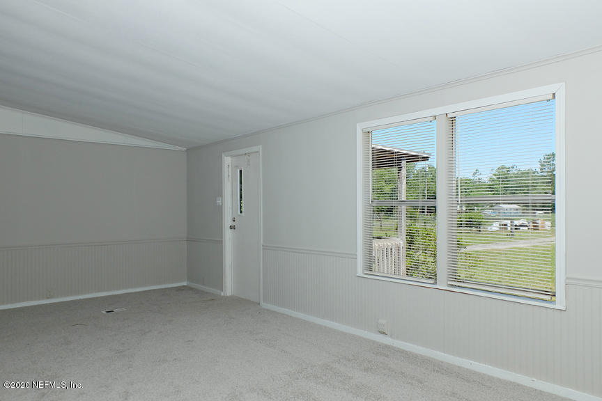 4075 Bronco Road Middleburg, FL 32068 - Photo 7 of 30 a view of an empty room with a window