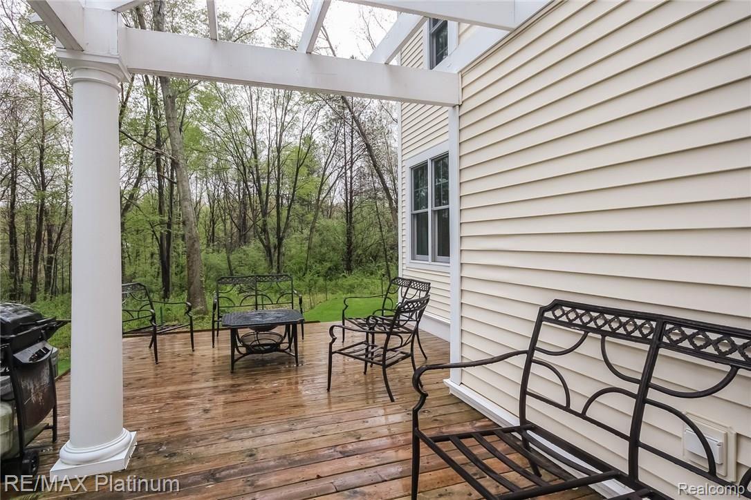 6945 Gawley Road Pinckney, MI 48169 - Photo 59 of 76 Beautiful back deck to enjoy watching the wildlife~