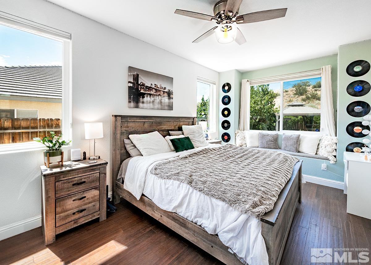 3095 Roxbury Drive Reno, NV 89523 - Photo 12 of 36 a bed sitting in a bedroom next to a window