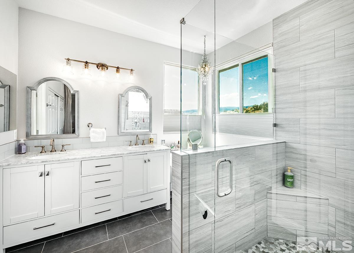 3095 Roxbury Drive Reno, NV 89523 - Photo 18 of 36 a bathroom with double vanity windows and a sink