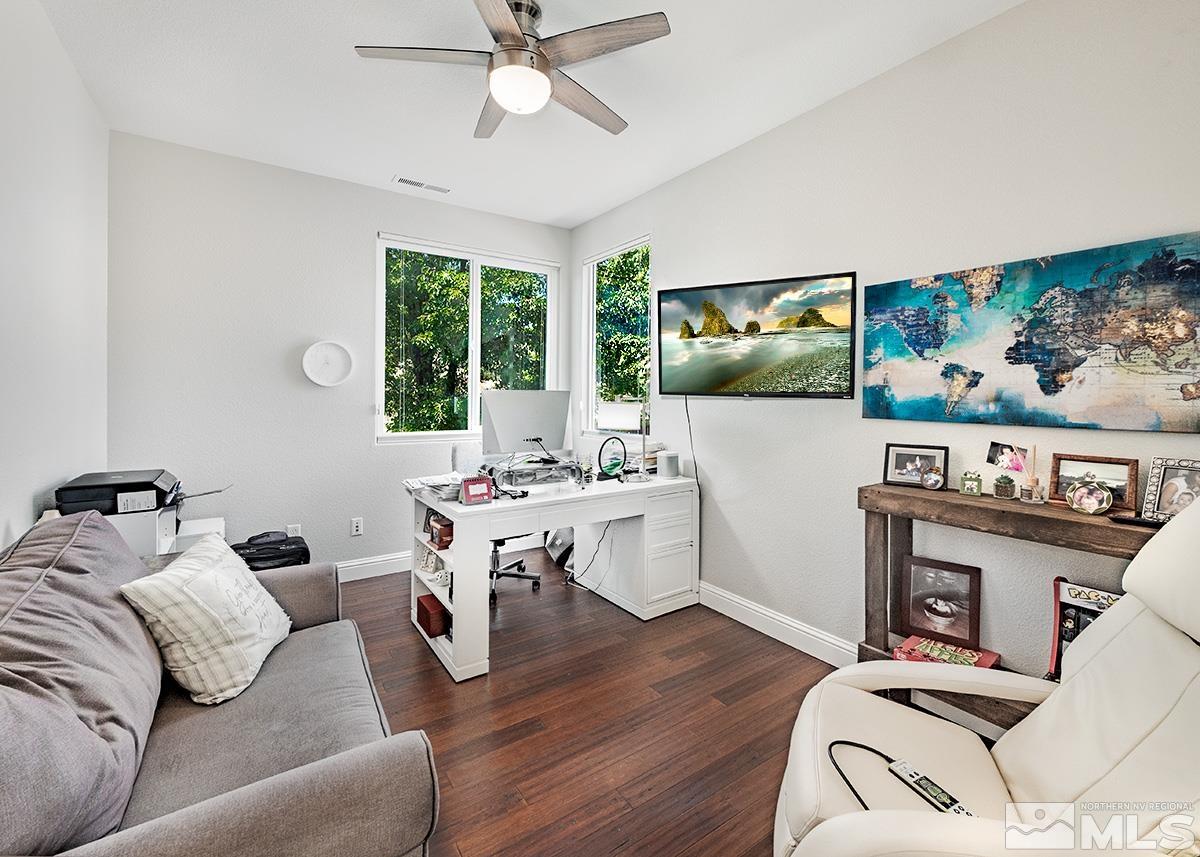 3095 Roxbury Drive Reno, NV 89523 - Photo 20 of 36 a living room with furniture and a flat screen tv