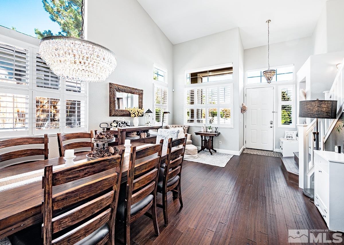 3095 Roxbury Drive Reno, NV 89523 - Photo 2 of 36 a view of a dining room with furniture window and wooden floor