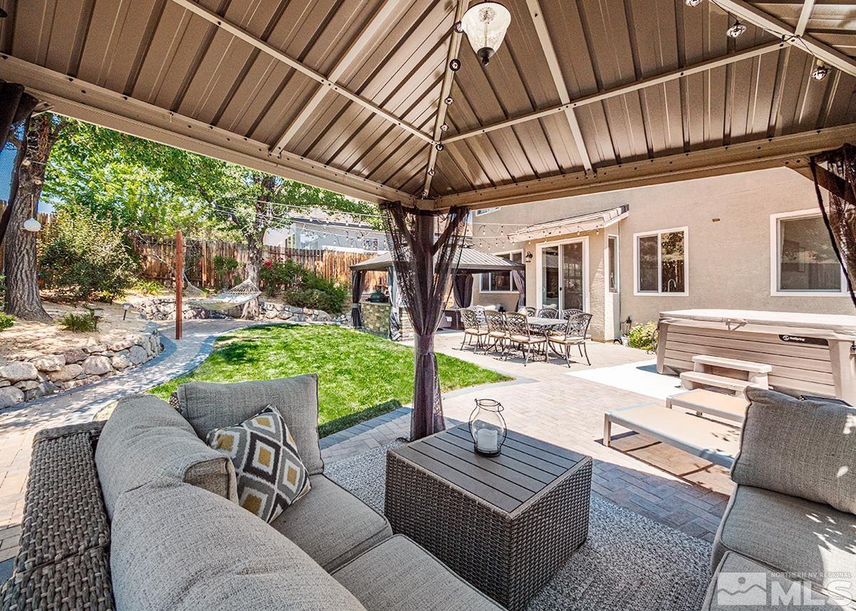 3095 Roxbury Drive Reno, NV 89523 - Photo 30 of 36 a view of an outdoor sitting area with furniture and garden view