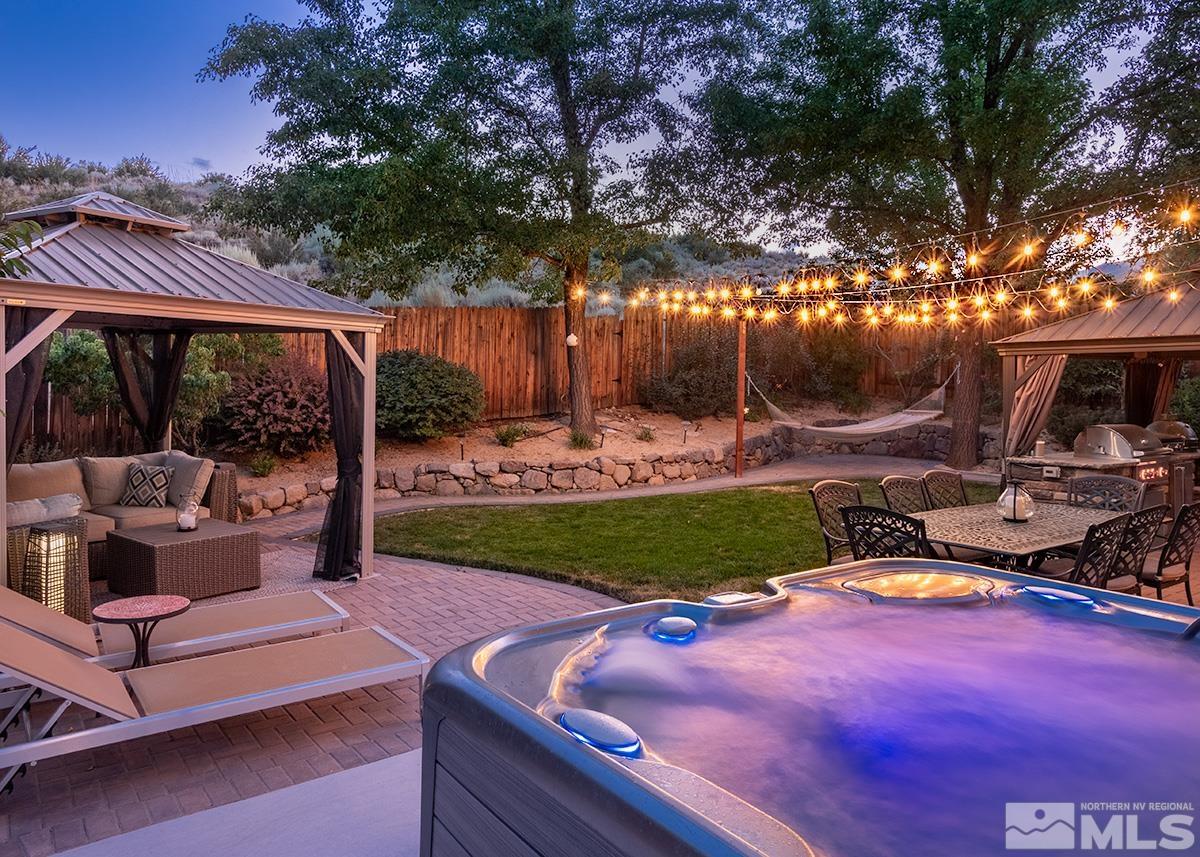 3095 Roxbury Drive Reno, NV 89523 - Photo 31 of 36 a view of a backyard with sitting area and furniture
