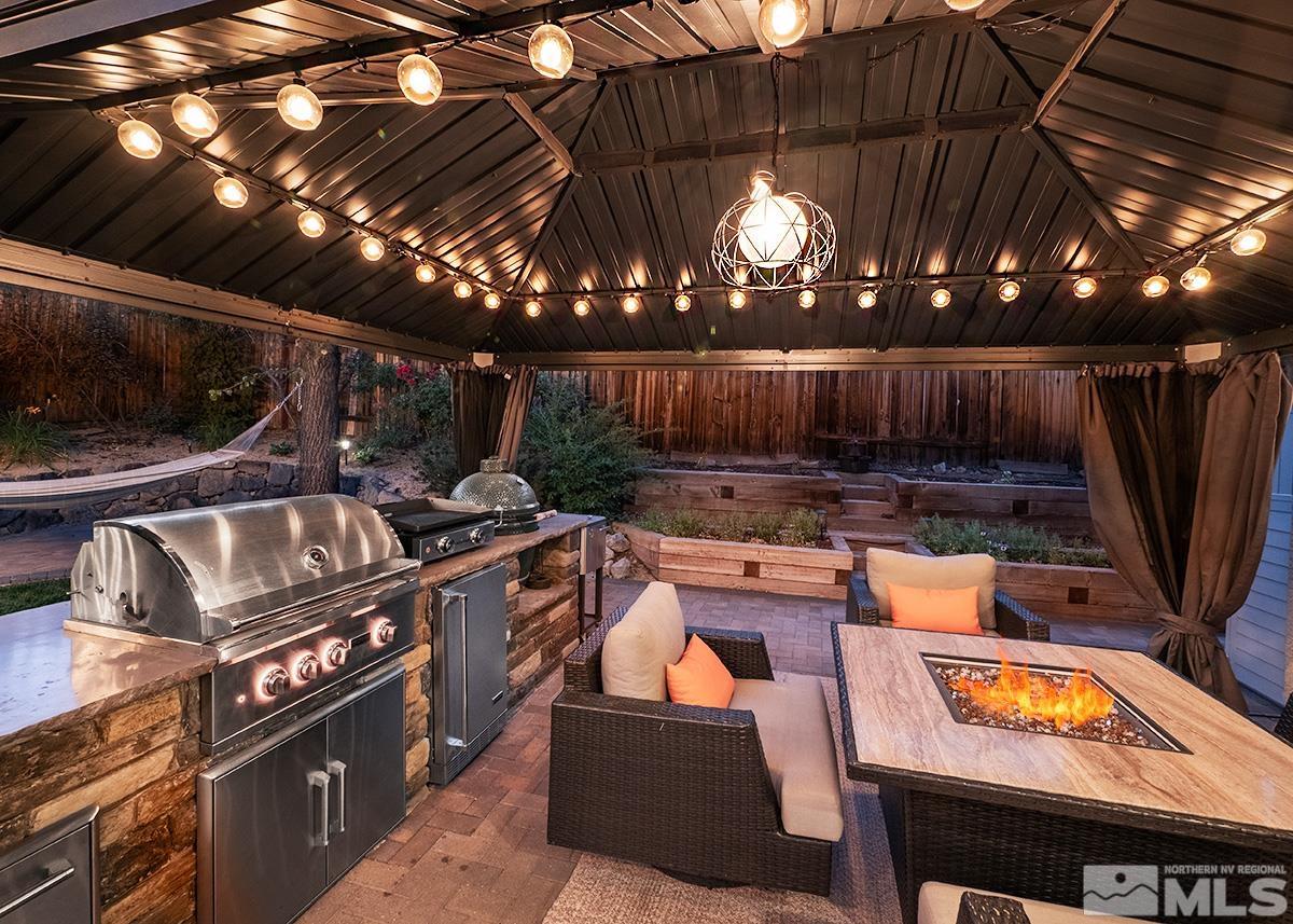 3095 Roxbury Drive Reno, NV 89523 - Photo 32 of 36 a view of a chairs and table in the patio