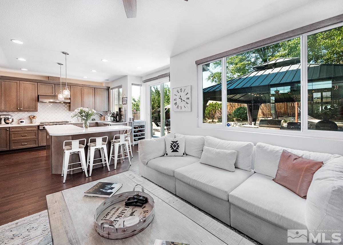 3095 Roxbury Drive Reno, NV 89523 - Photo 6 of 36 a living room with furniture and a large window
