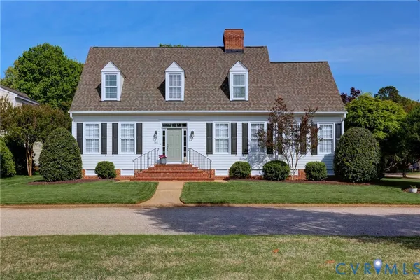 front view of house with a yard