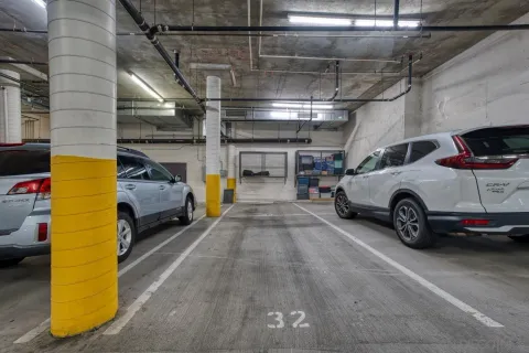 a table and chairs in front of a building