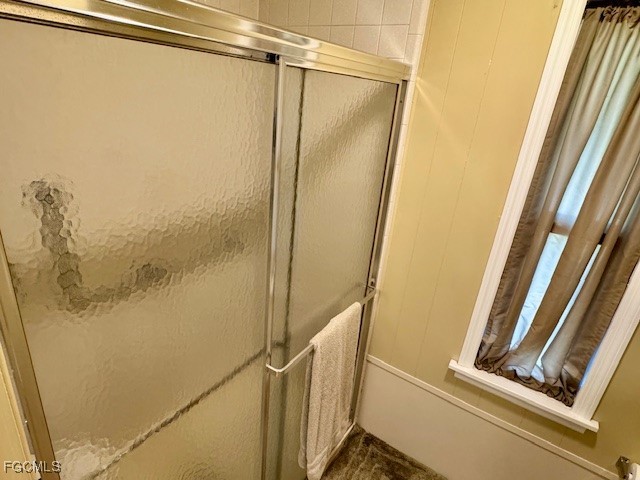 5520 Colonial Road North Fort Myers, FL 33917 - Photo 13 of 44 a bathroom with a shower and a mirror