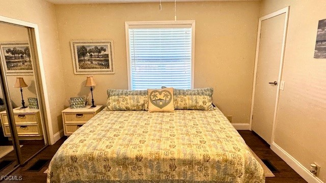 5520 Colonial Road North Fort Myers, FL 33917 - Photo 15 of 44 a large bed sitting in a bedroom next to a window