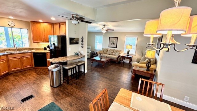 5520 Colonial Road North Fort Myers, FL 33917 - Photo 2 of 44 a living room with furniture fireplace and a large window