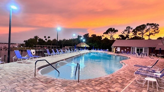5520 Colonial Road North Fort Myers, FL 33917 - Photo 29 of 44 a view of a swimming pool with a lounge chair