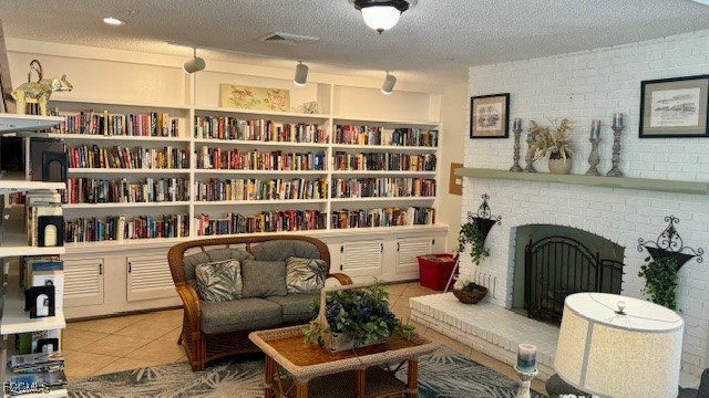 5520 Colonial Road North Fort Myers, FL 33917 - Photo 32 of 44 a living room with furniture and a book shelf