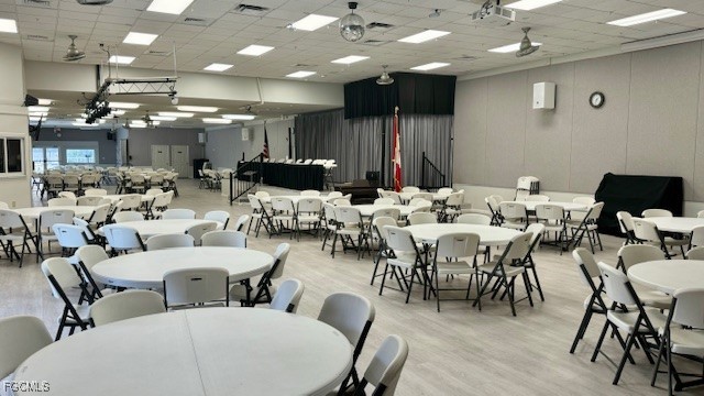 5520 Colonial Road North Fort Myers, FL 33917 - Photo 33 of 44 a group of people sitting at kitchen in a room