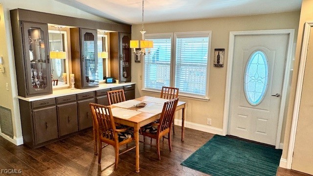 5520 Colonial Road North Fort Myers, FL 33917 - Photo 6 of 44 a view of a dining room with furniture window and wooden floor