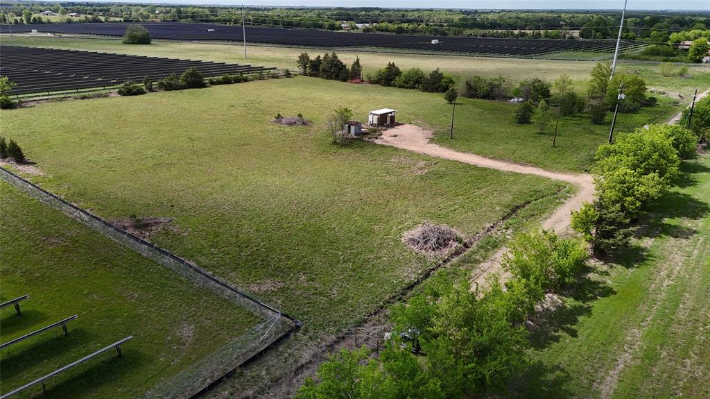 0 Road 22700 Road Paris, TX 75460 - Photo 4 of 15 a view of a lake with a yard