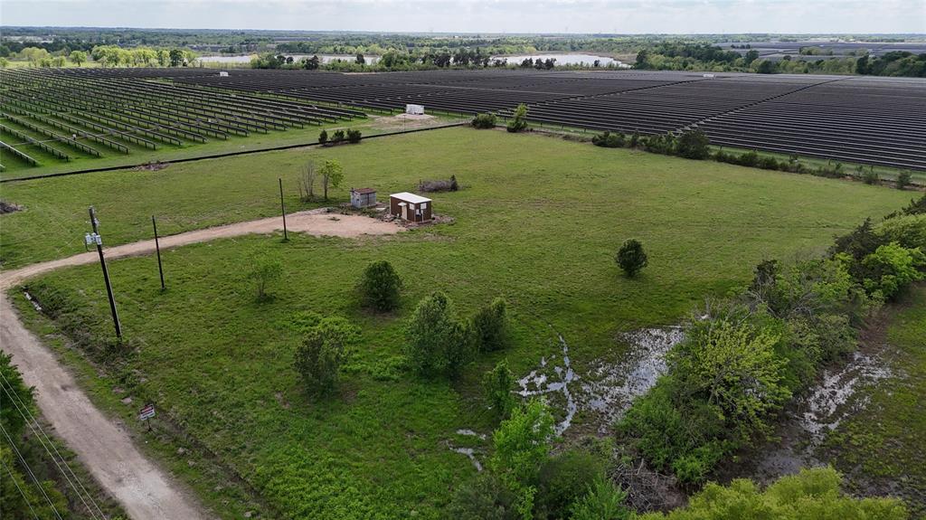 0 Road 22700 Road Paris, TX 75460 - Photo 7 of 15 aerial view of a house with a lake view