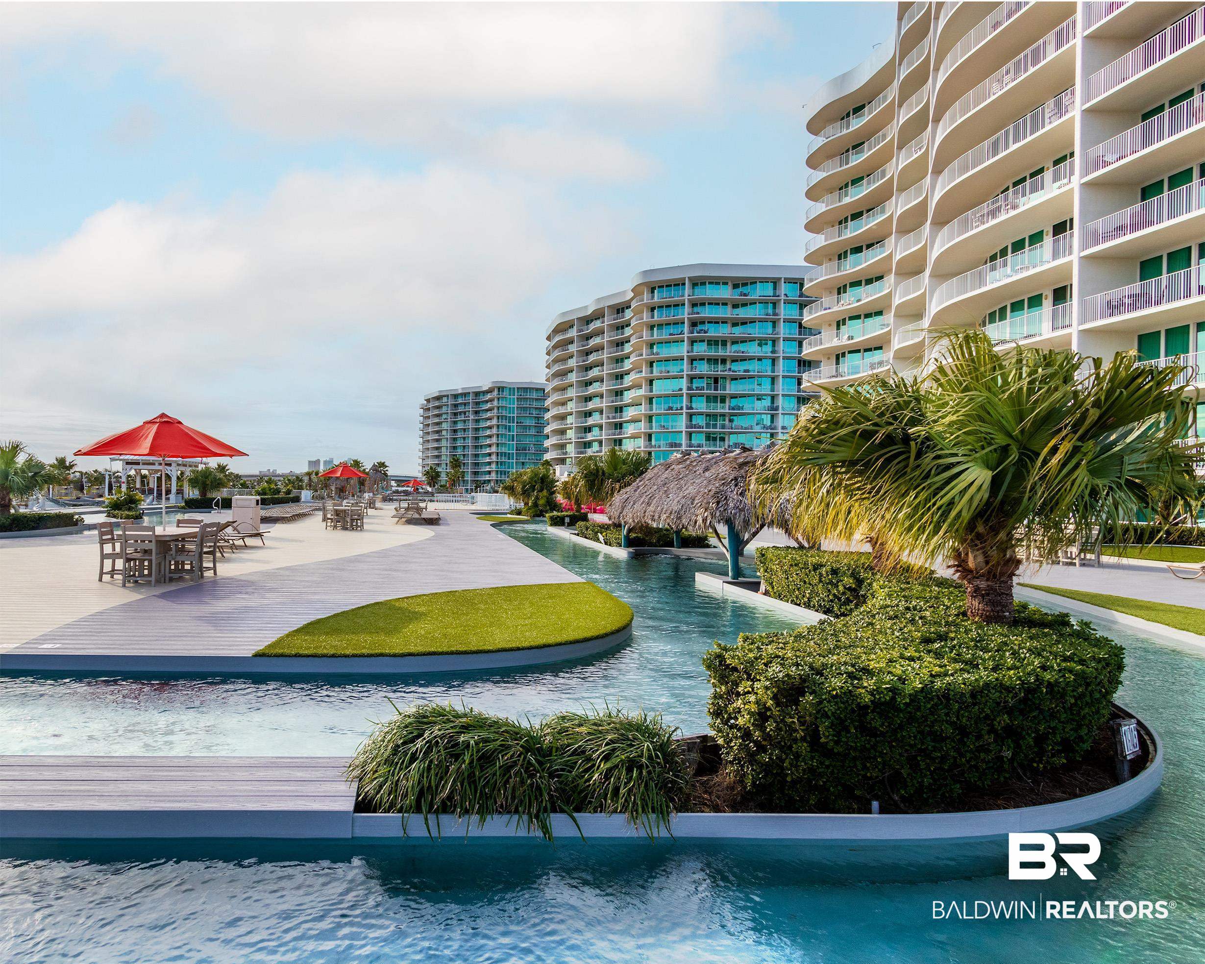 28107 Perdido Beach Boulevard, Unit DPH05 Orange Beach, AL 36561 - Photo 28 of 43 View of community featuring outdoor dining space and a water view