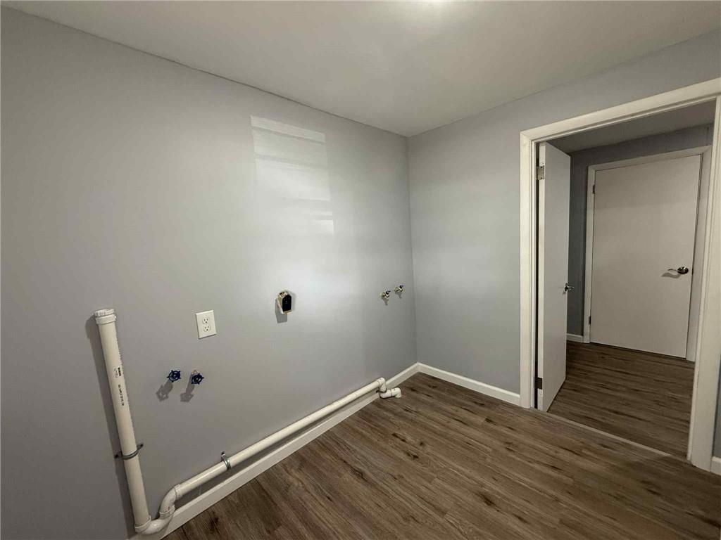 34 Lexington Avenue Uniontown, PA 15401 - Photo 25 of 29 a view of a room with wooden floor and white walls