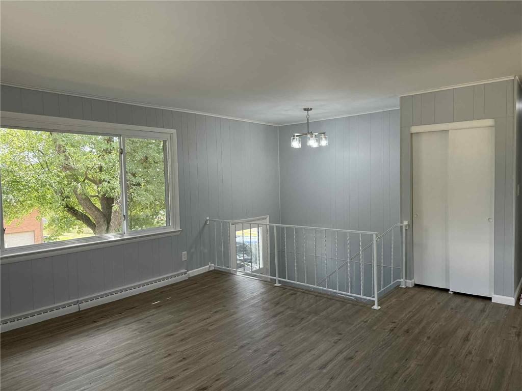 34 Lexington Avenue Uniontown, PA 15401 - Photo 4 of 29 an empty room with wooden floor and windows
