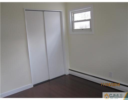 139 Winthrop Road Edison, NJ 08817 - Photo 13 of 17 an empty room with windows