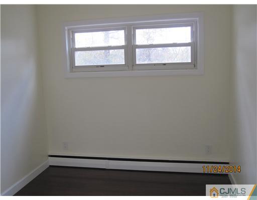 139 Winthrop Road Edison, NJ 08817 - Photo 14 of 17 a view of an empty room with a window