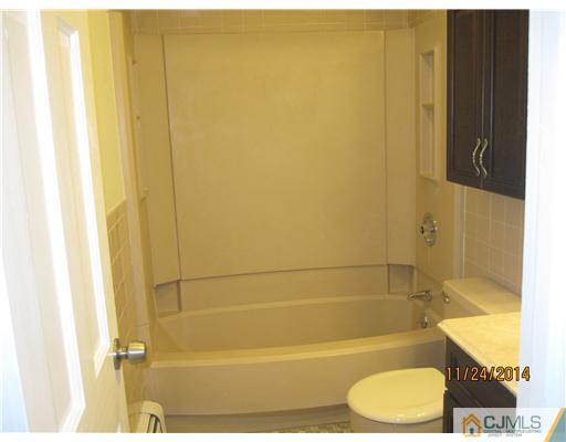 139 Winthrop Road Edison, NJ 08817 - Photo 16 of 17 a bathroom with a toilet and shower