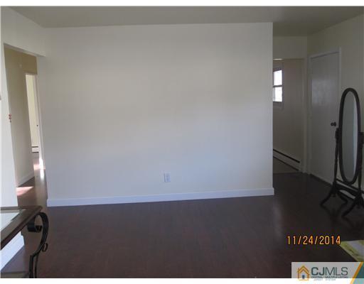 139 Winthrop Road Edison, NJ 08817 - Photo 4 of 17 view of an empty room and a window