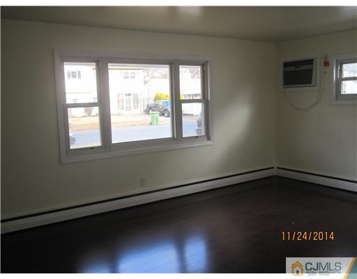 139 Winthrop Road Edison, NJ 08817 - Photo 5 of 17 a view of an empty room with a window