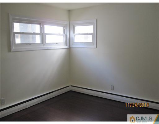 139 Winthrop Road Edison, NJ 08817 - Photo 10 of 17 an empty room with a window