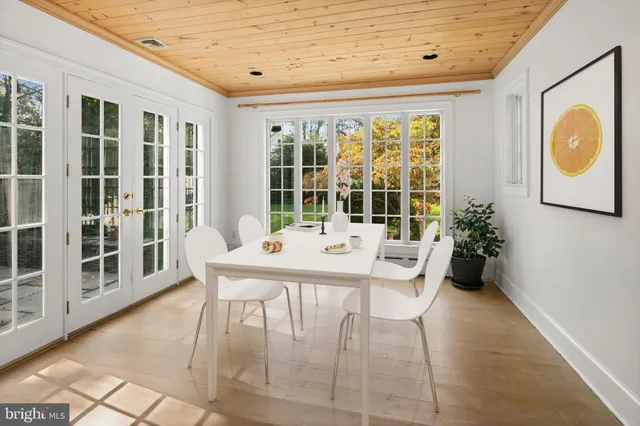 a kitchen with stainless steel appliances a refrigerator and a sink