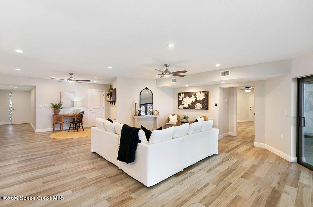 110 Barnacle Place Rockledge, FL 32955 - Photo 35 of 71 a living room with furniture and wooden floor