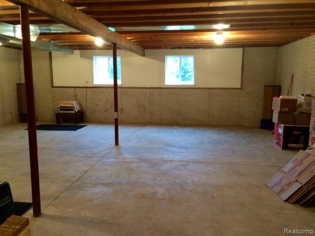 4312 Adams Road Stockbridge, MI 49285 - Photo 23 of 24 Basement one side is ready to finish or enjoy!