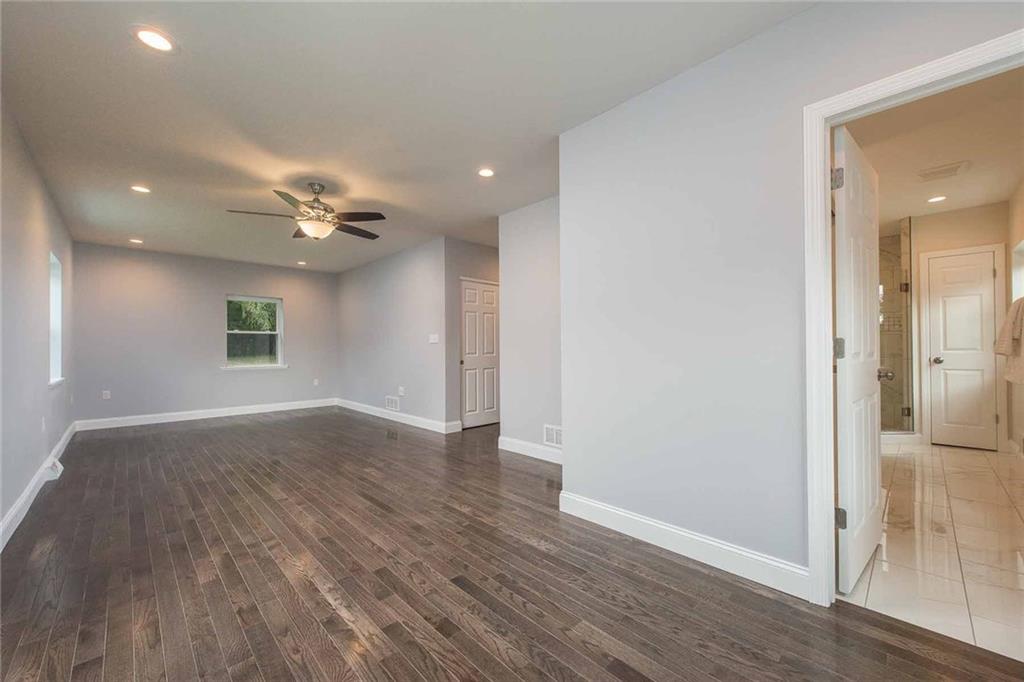 226 McCoy Place Road Sewickley, PA 15143 - Photo 12 of 25 Main level master bedroom is spacious, bright and peaceful. Boasting two large closets, one a walk-in, and a huge en-suite with high-end finishes.