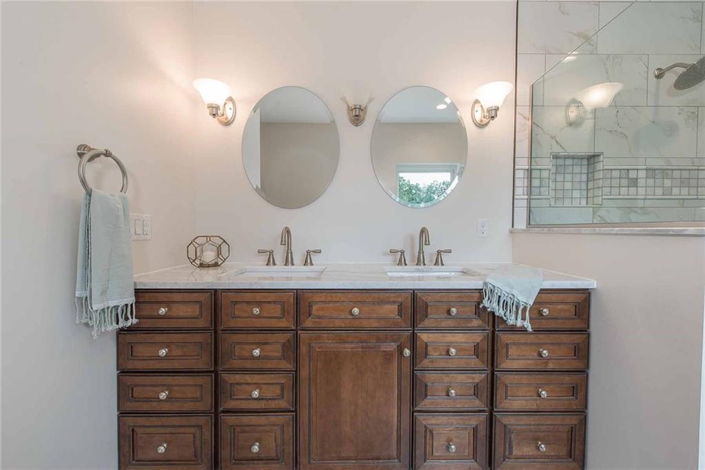 226 McCoy Place Road Sewickley, PA 15143 - Photo 14 of 25 Light and bright with lots of space for two, this master bathroom makes mornings delightful! Marble counter and glazed cabinetry add class to this master en-suite.