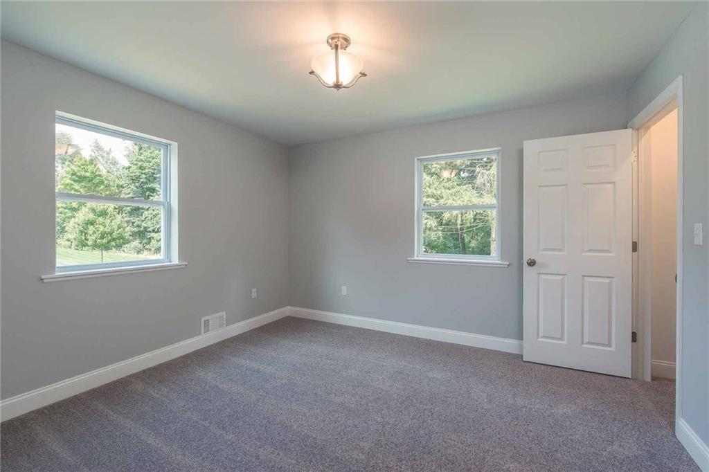 226 McCoy Place Road Sewickley, PA 15143 - Photo 19 of 25 Bright and spacious additional bedroom with large closet and big windows provides another great space for a family member or guest.
