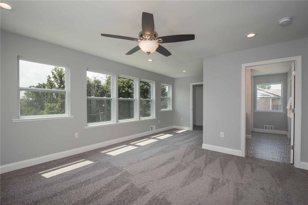 226 McCoy Place Road Sewickley, PA 15143 - Photo 20 of 25 Upstairs master/guest suite has another dreamy bathroom! The bay of three windows plus two more in this room are amazing and take advantage of the tree views. Another walk in closet in room is perfect for a master bedroom.