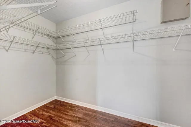 a view of a small space with racks on the wall