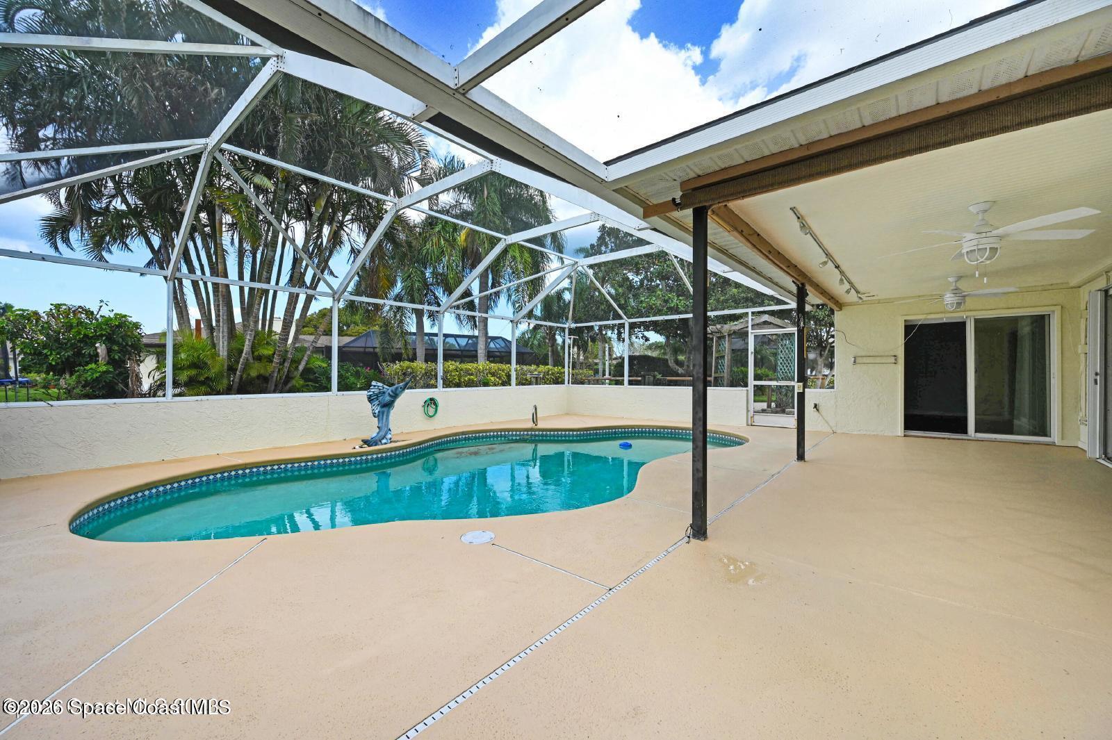 296 Sandy Run Melbourne, FL 32940 - Photo 20 of 23 a view of outdoor space and swimming pool