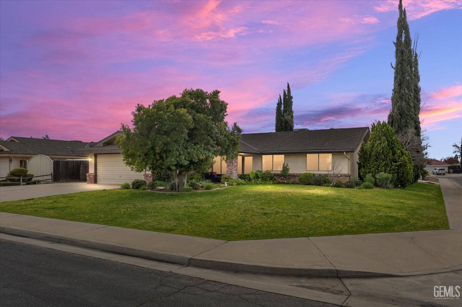 Undisclosed Address Bakersfield, CA 93311 - Photo 1 of 35 a front view of a house with a yard