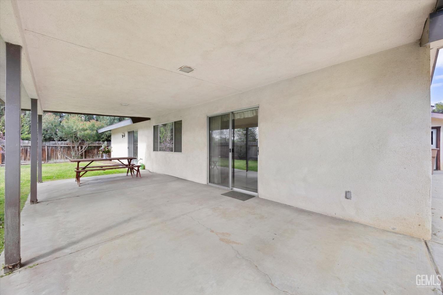 Undisclosed Address Bakersfield, CA 93311 - Photo 30 of 35 a view of a livingroom with wooden floor and a couch
