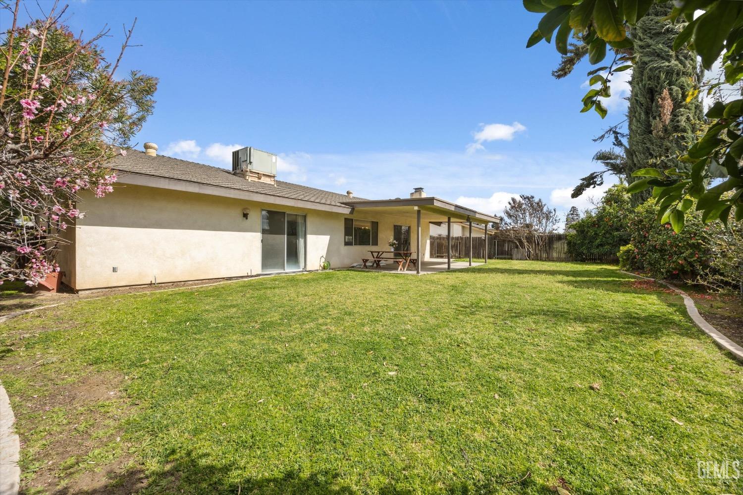 Undisclosed Address Bakersfield, CA 93311 - Photo 32 of 35 a front view of a house with a yard