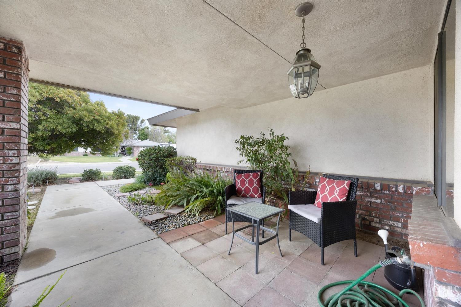 Undisclosed Address Bakersfield, CA 93311 - Photo 5 of 35 a outdoor living space with furniture and flowers
